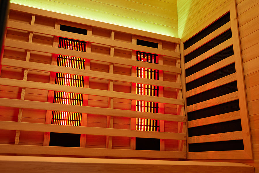 Wide interior view of the four-person infrared sauna from the doorway