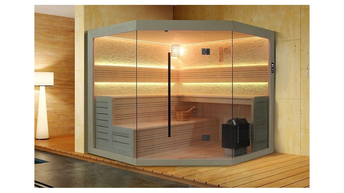 Slate 220 indoor traditional sauna in white stone, a six-person cabin with a glass front and tiered wooden benches