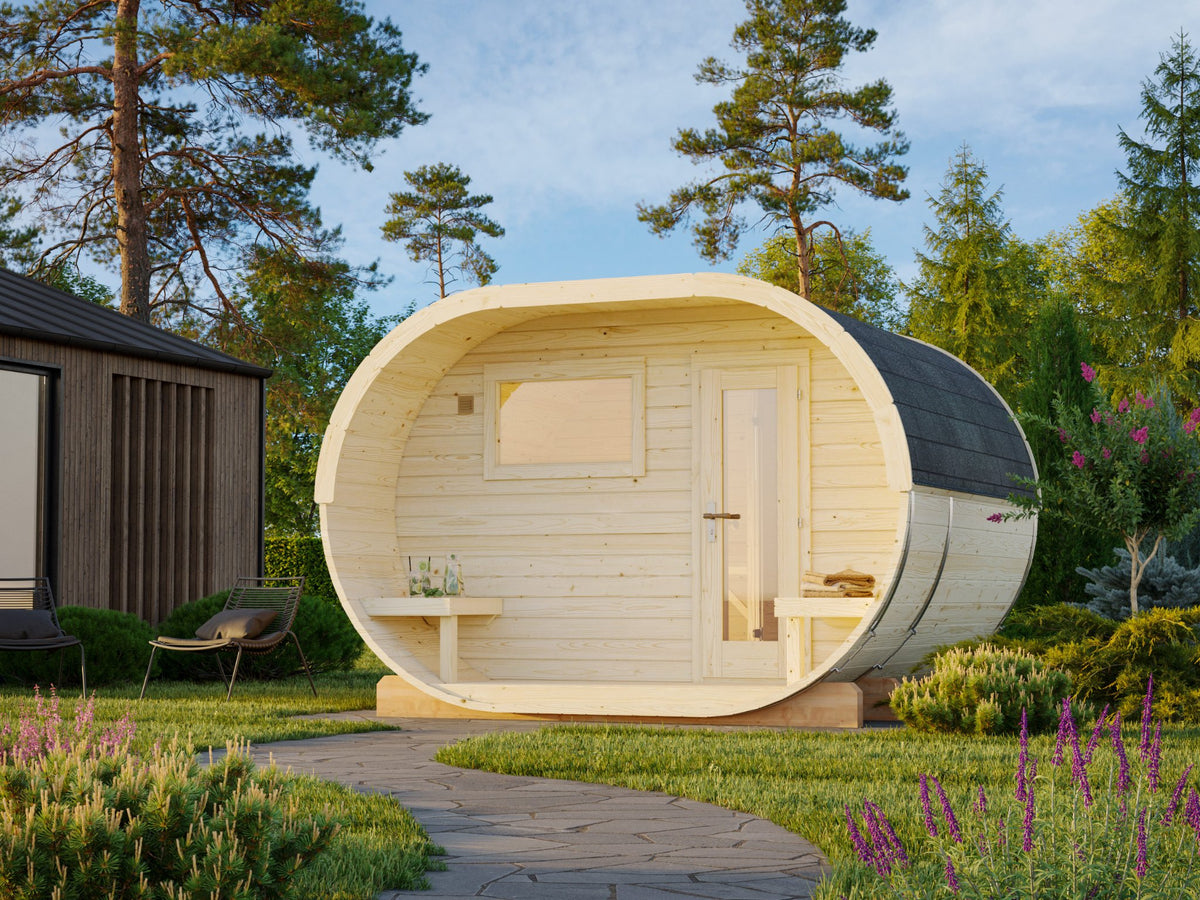 Laine 330 oval sauna in Nordic spruce in a garden