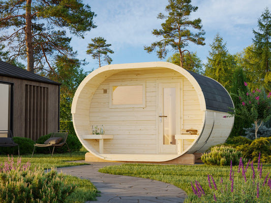 Laine 330 oval sauna in Nordic spruce in a garden