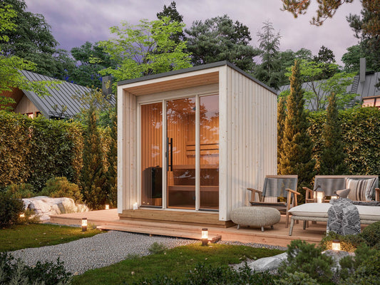 Meri 230 insulated garden sauna in a garden