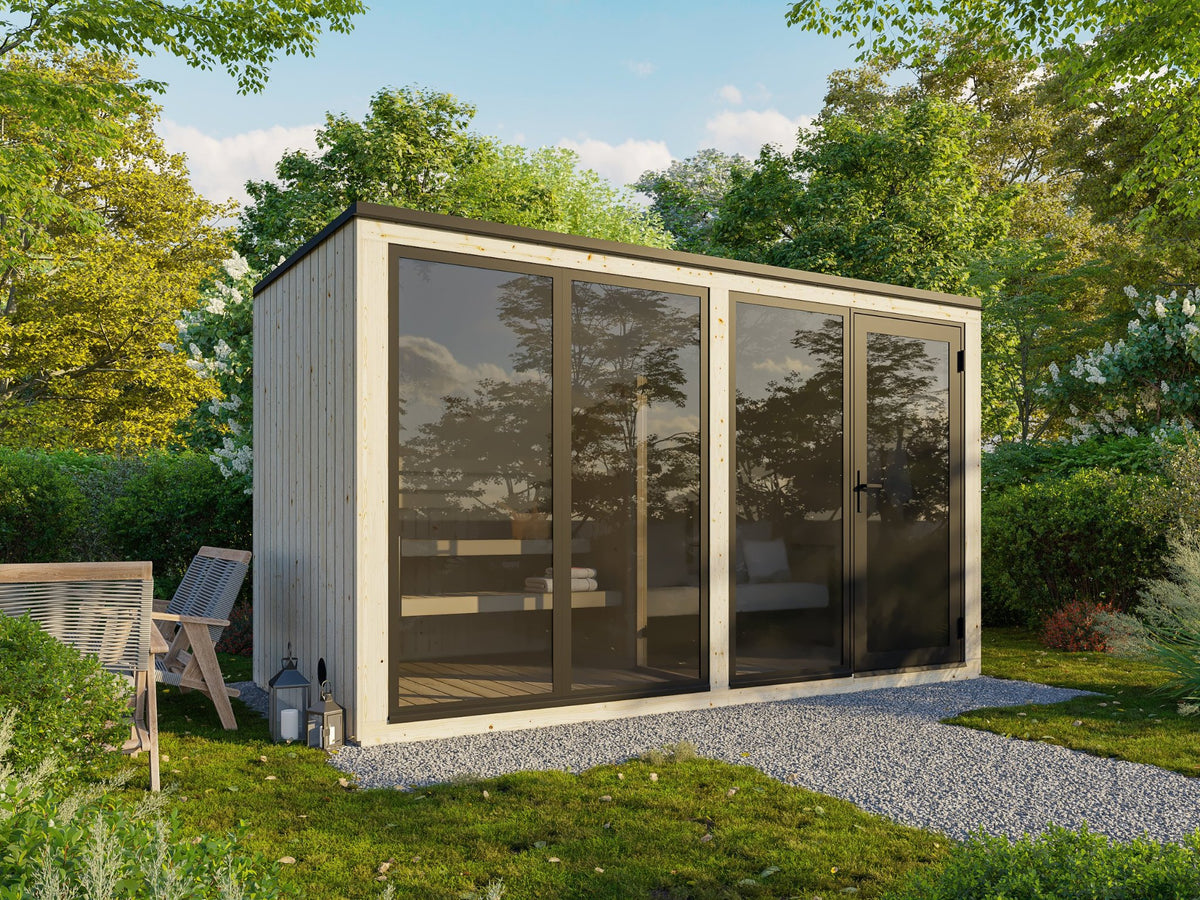 Valgus 400 insulated sauna house in a garden