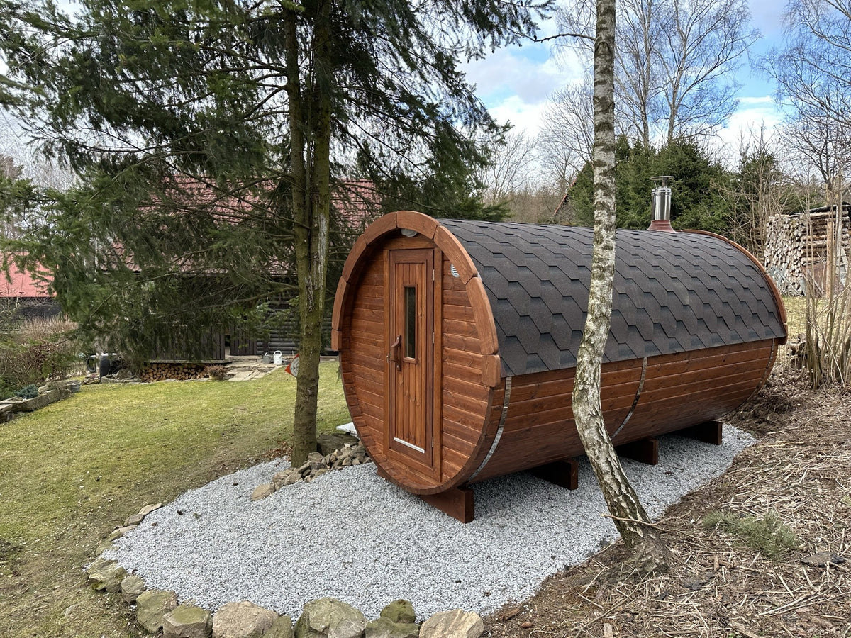 Holvi 350 side view showing the length of the barrel and the shingle roof