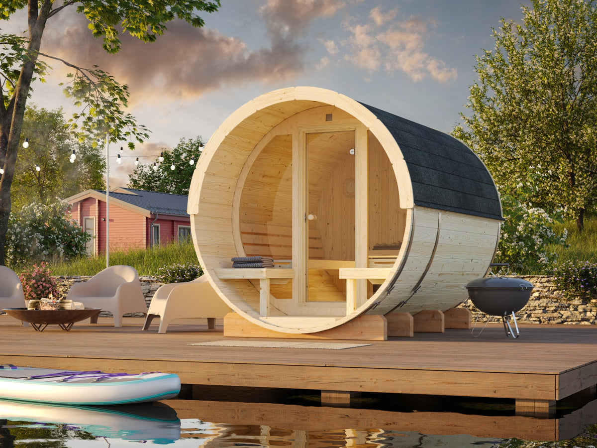 Vaat 290 spruce barrel sauna with glass front in a garden