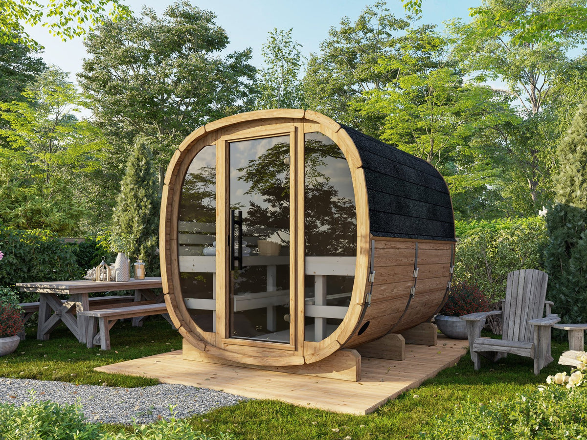 Koda 220 thermowood sauna with glass front in a garden