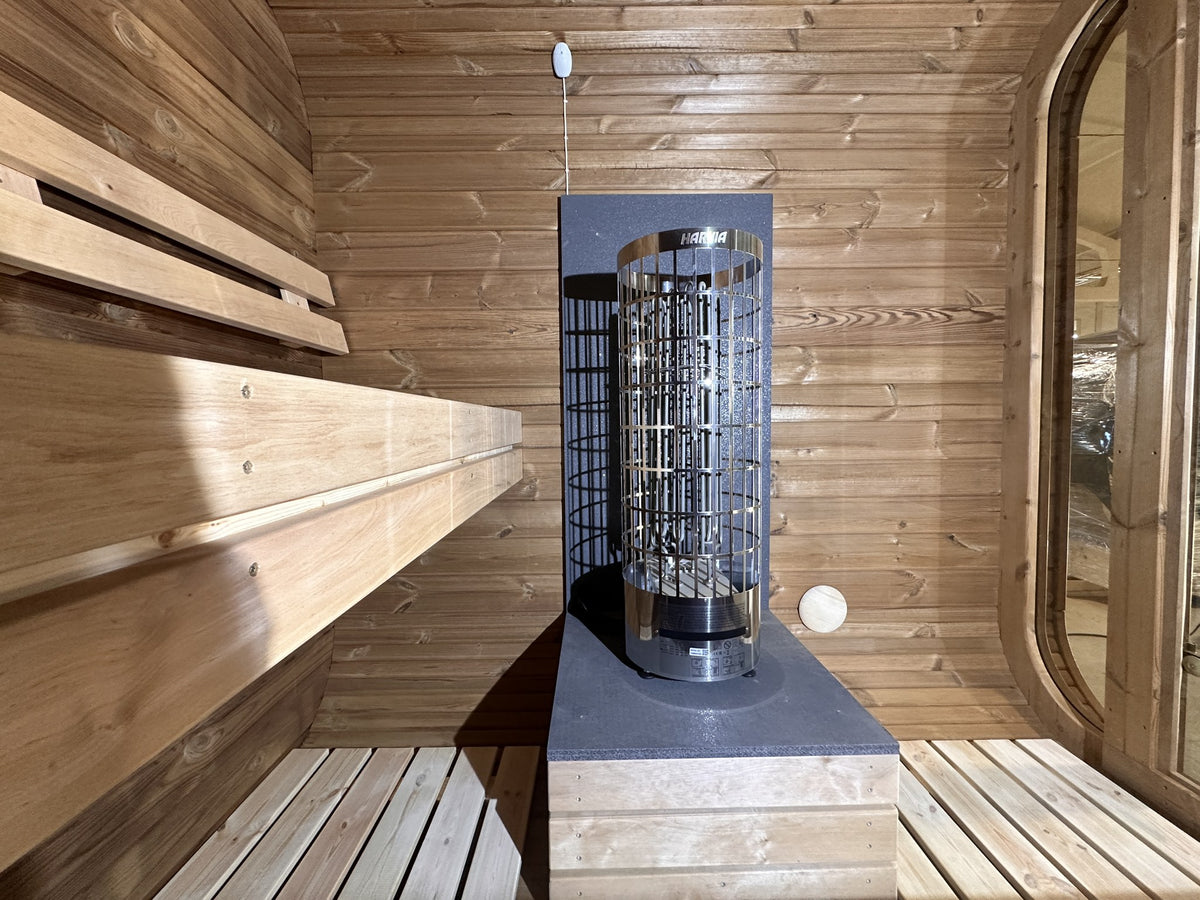 Ruutu 230 interior with Harvia Cilindro heater and tiered bench seating