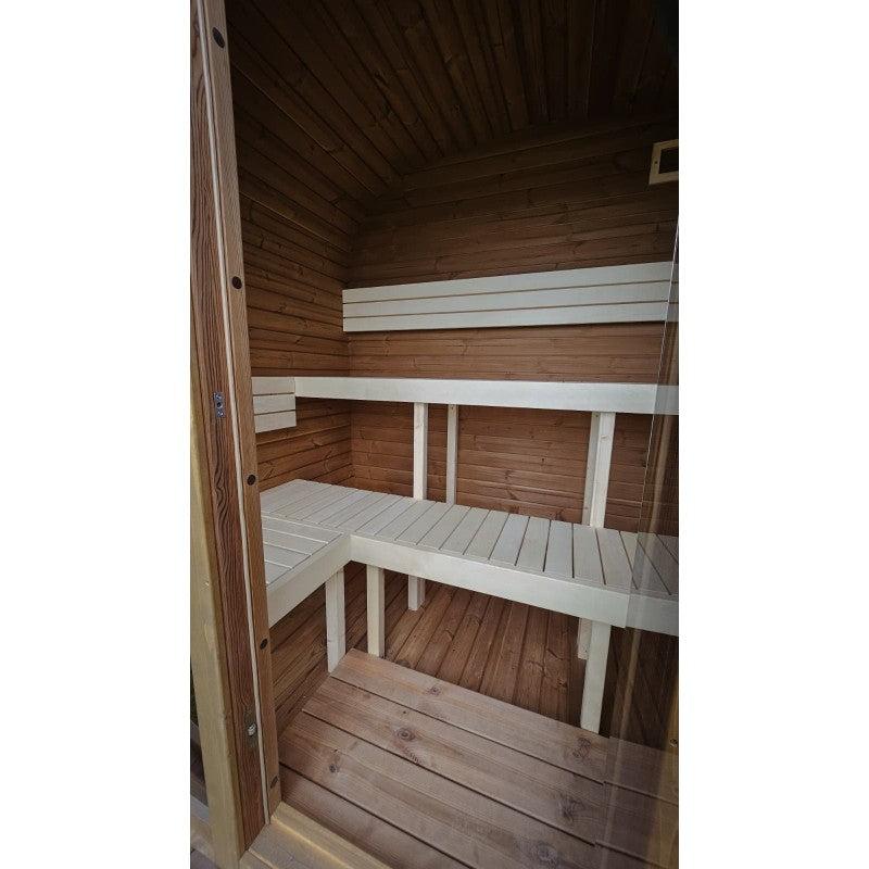 Interior of the 1.6m Cube Sauna with linden wood benches and backrest