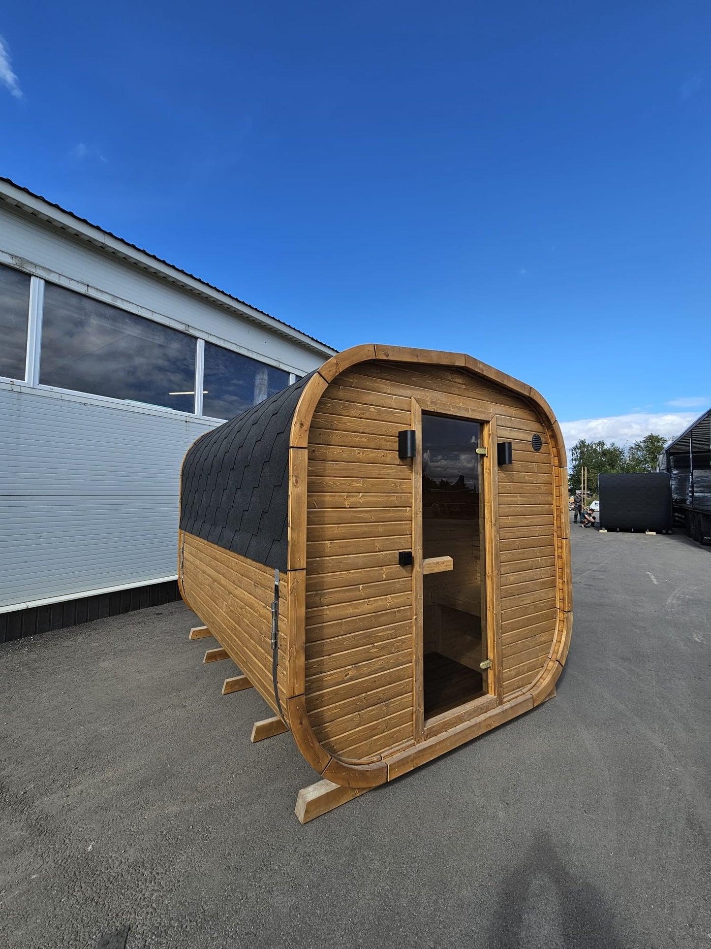 Cube Sauna 2m thermowood exterior against a clear blue sky