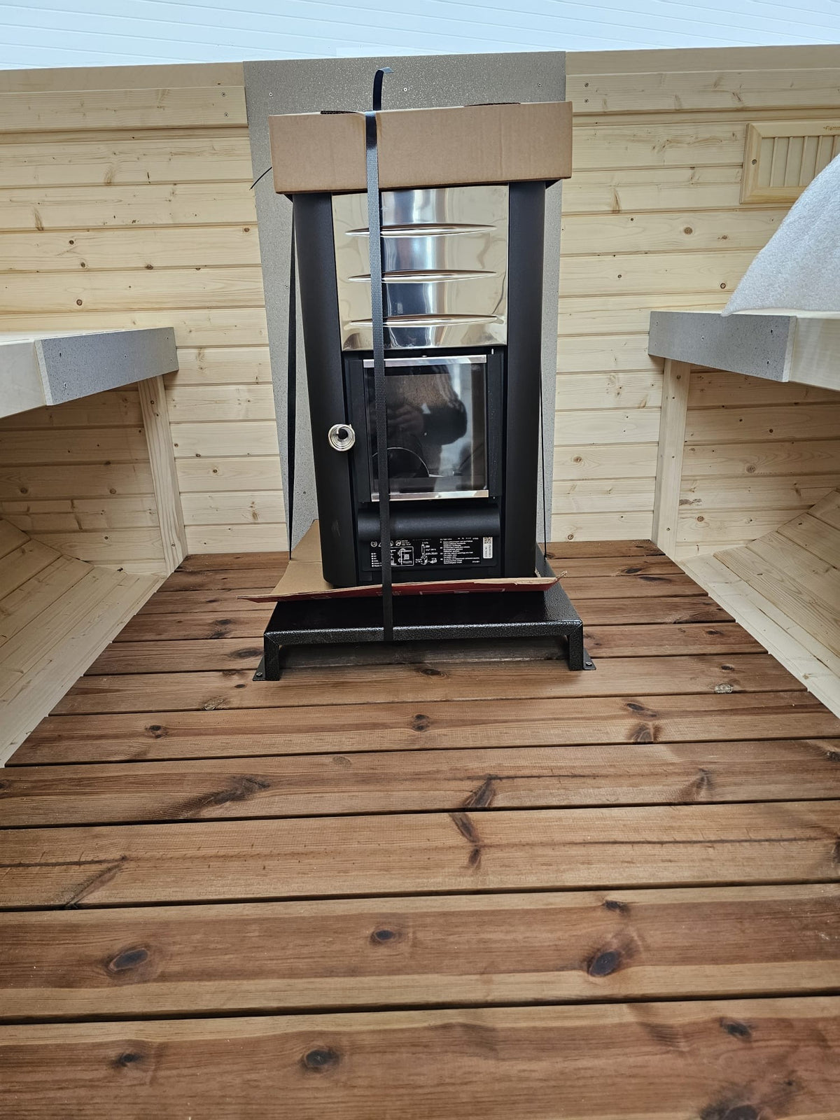 Cube Sauna 2m interior deck boards leading to the wood-fired heater