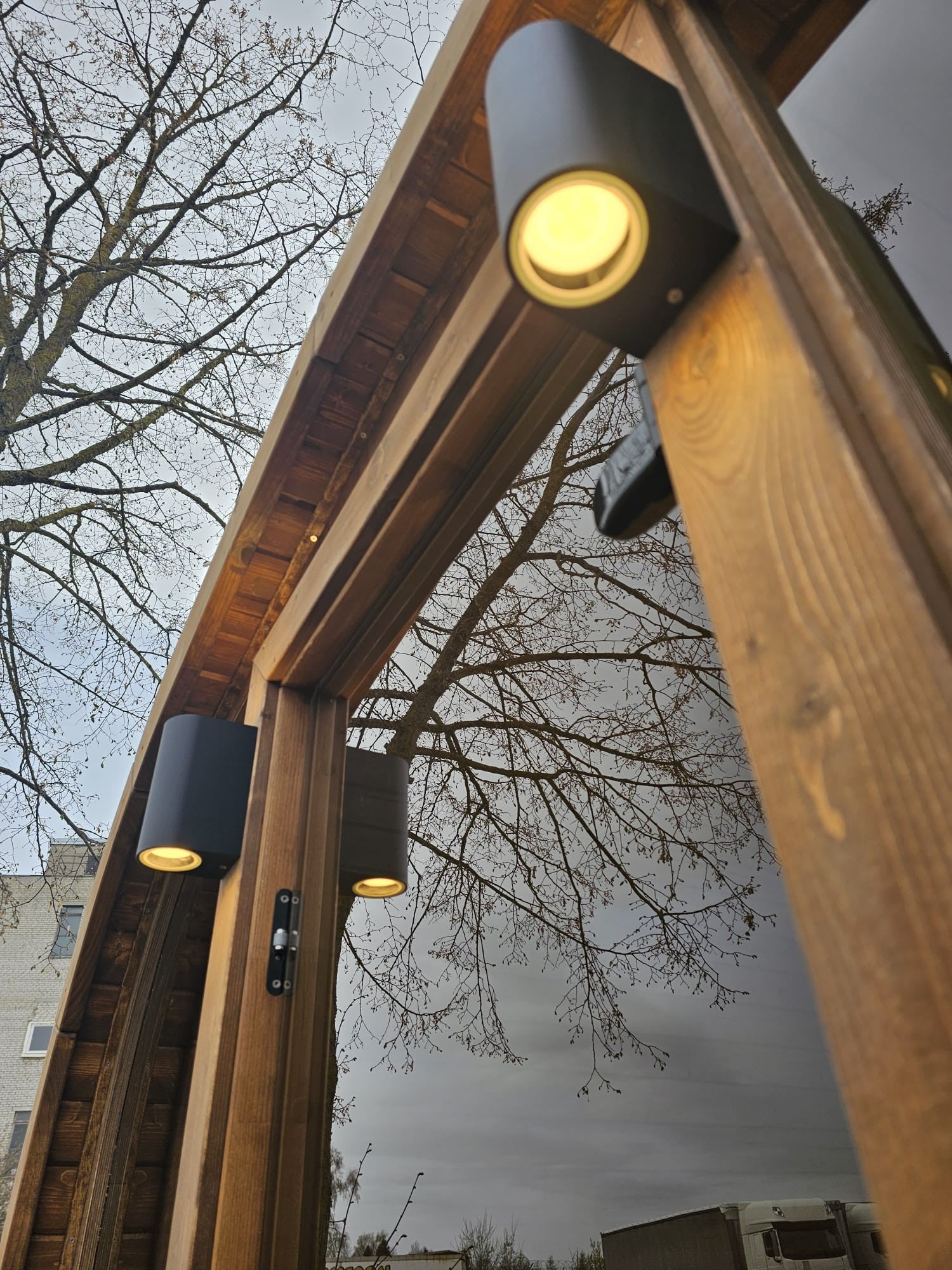 Cube Sauna 2m exterior Harvia wall light mounted on the thermowood cladding