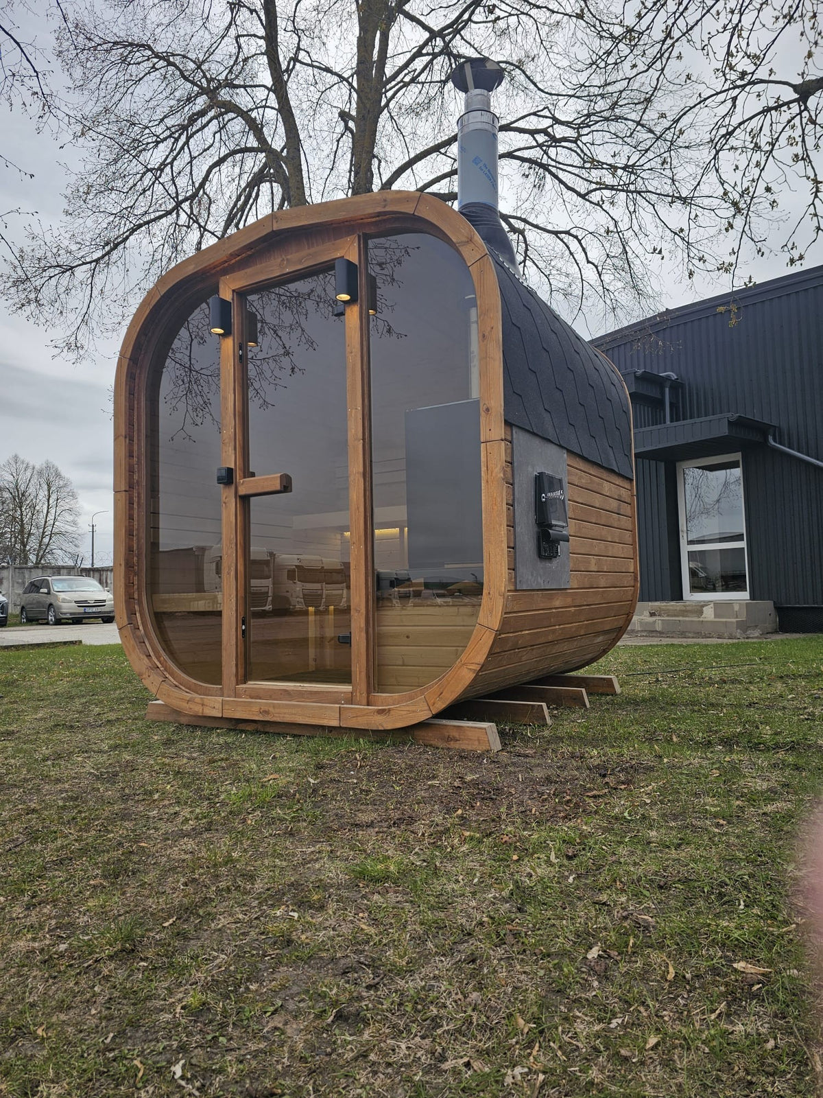 Cube Sauna 2m side profile with rounded thermowood corners and shingle roof