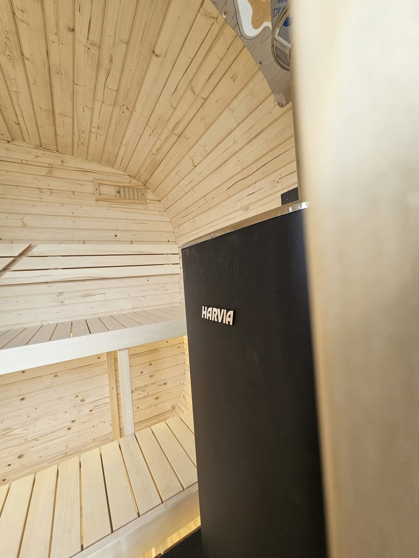 Cube Sauna 2m interior showing the Harvia heater beside the bench