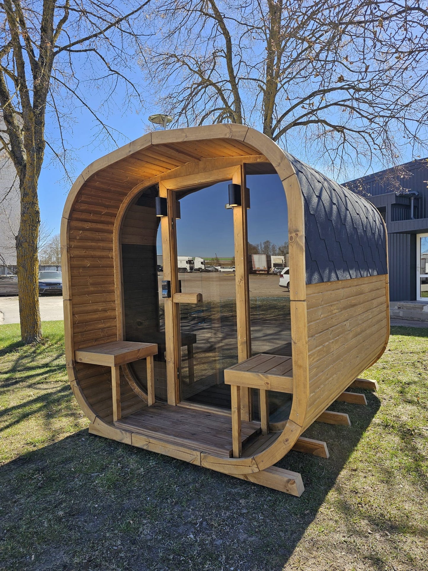 Cube Sauna 2m open front with two bench stools on the timber base frame