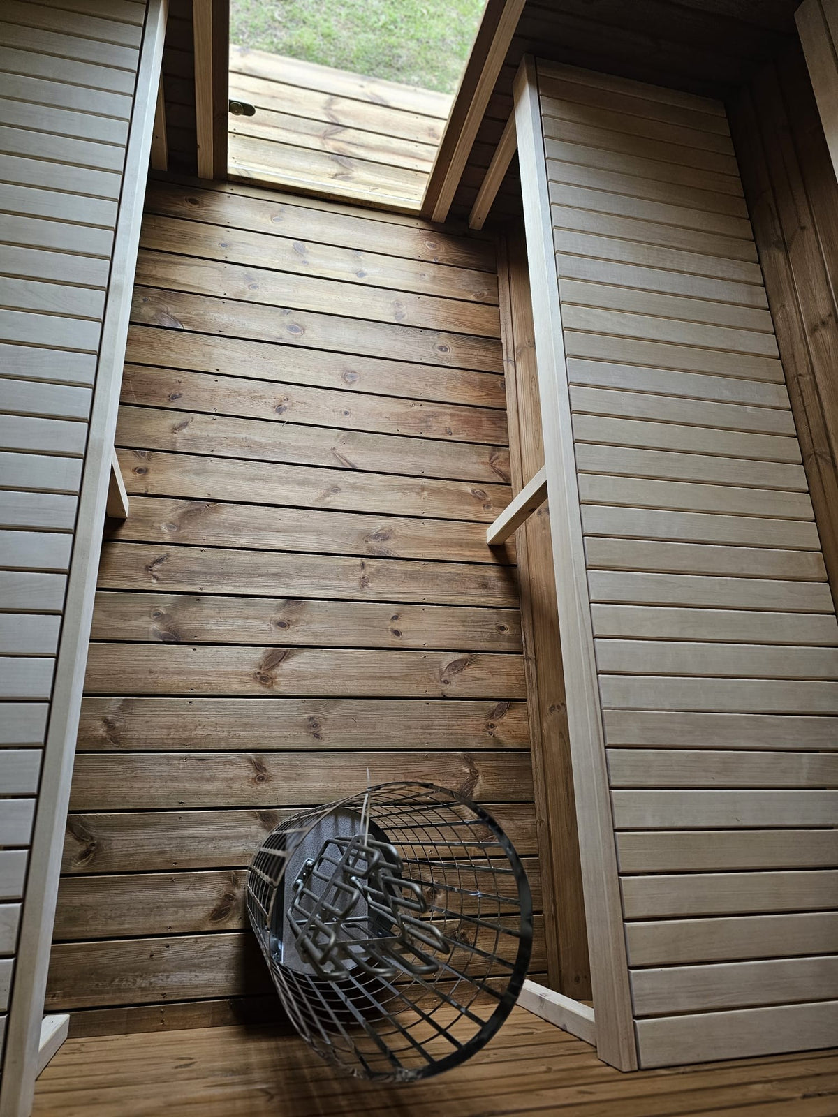Vanne thermowood barrel sauna interior with linden benches