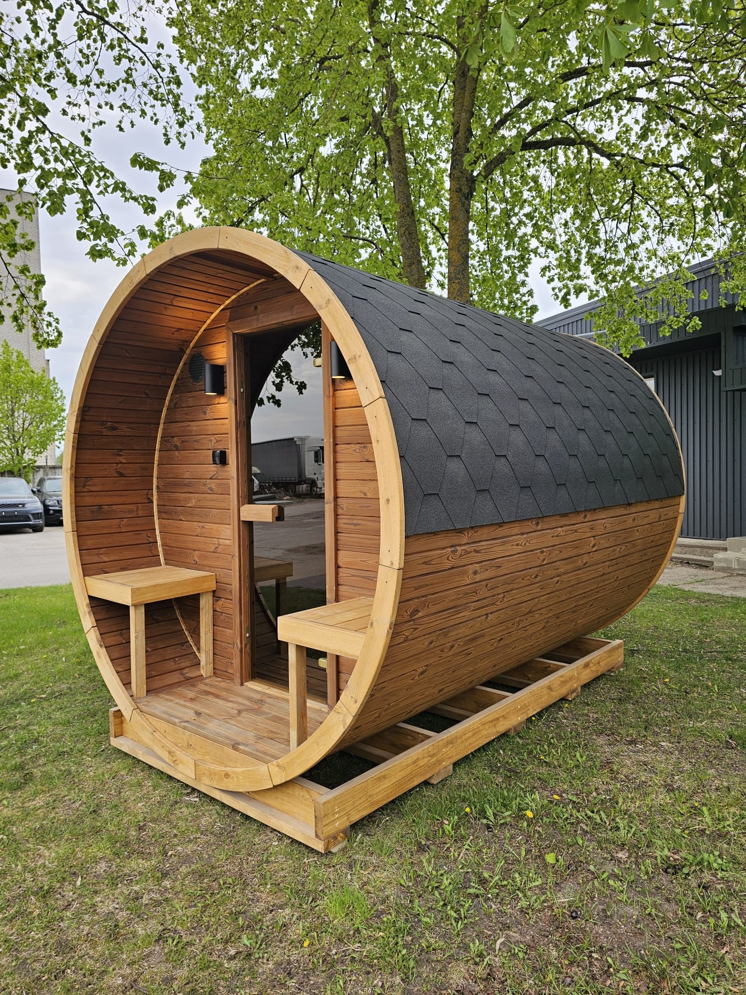 Steam and Oak Vanne 3m thermowood barrel sauna in a UK garden