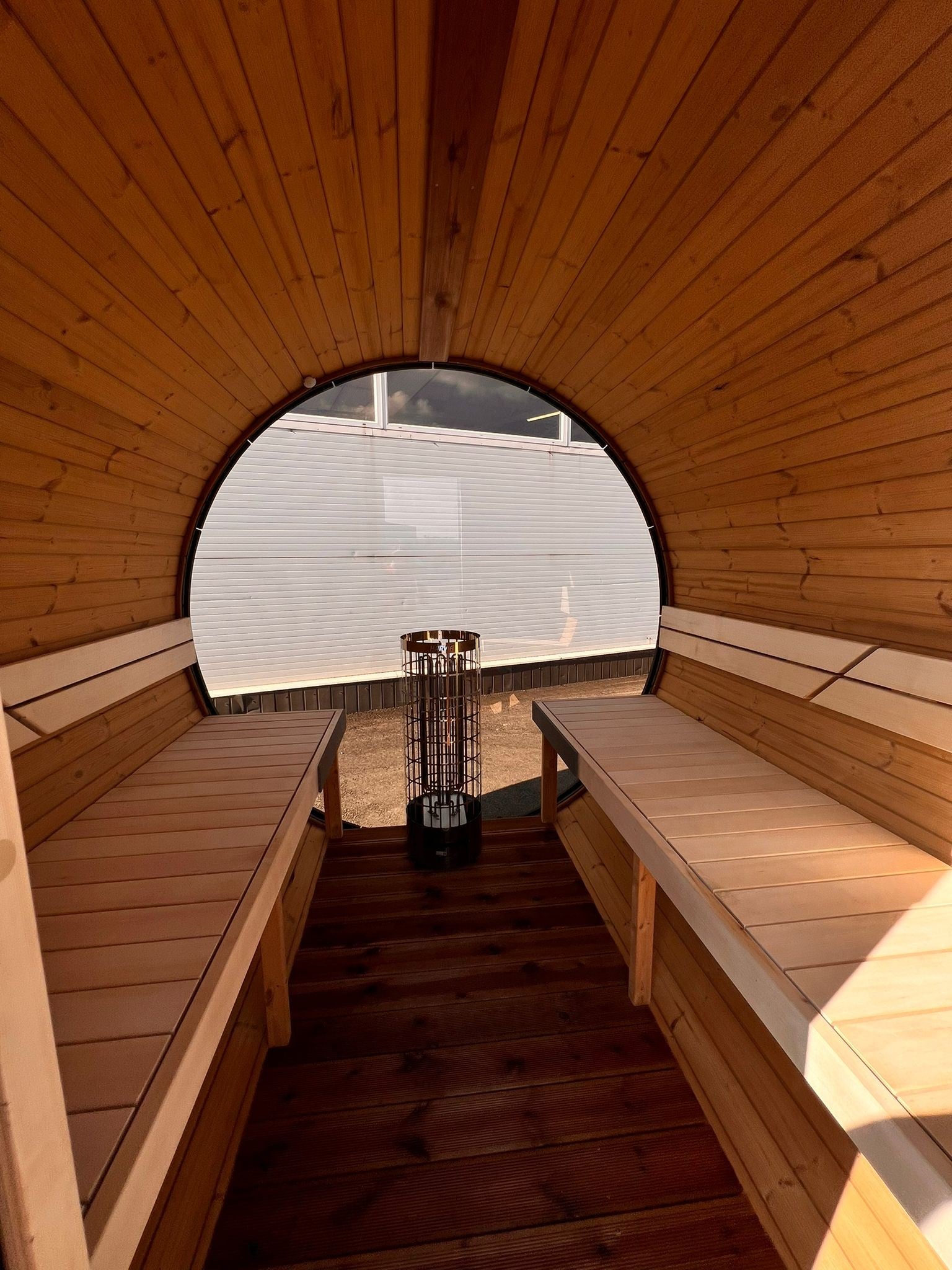 Harvia Cilindro 9kW heater fitted in the Hiili black barrel sauna