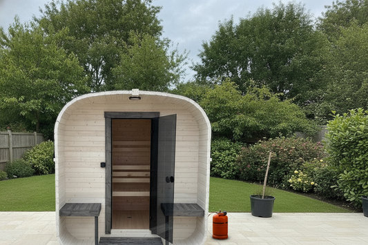 Steam & Oak gas cube sauna 2.4m double-shelf with propane gas bottle in a UK garden