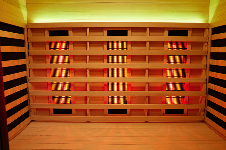 Infrared sauna interior showing the bench seating and wall emitter panels