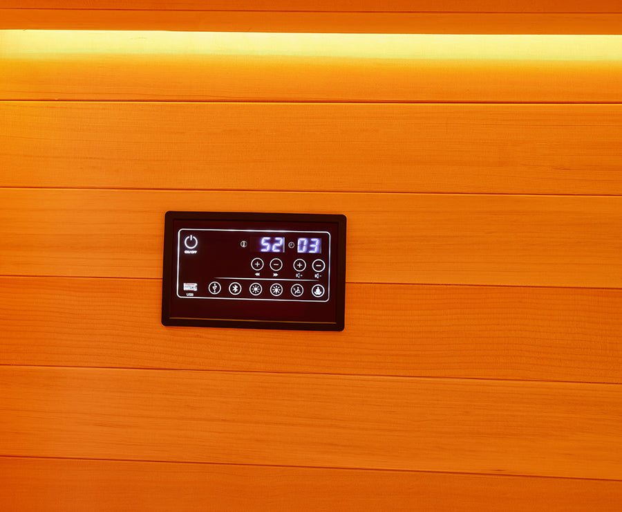 Close-up of the sauna control panel showing temperature, timer, lighting and audio controls