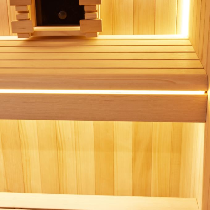Second interior detail of the hybrid sauna showing the wall panelling