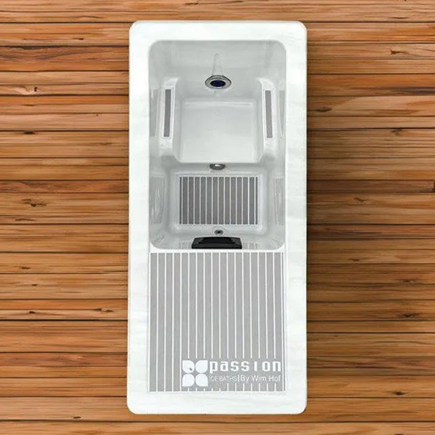 The ice bath with the cover removed, showing the white interior and moulded seat