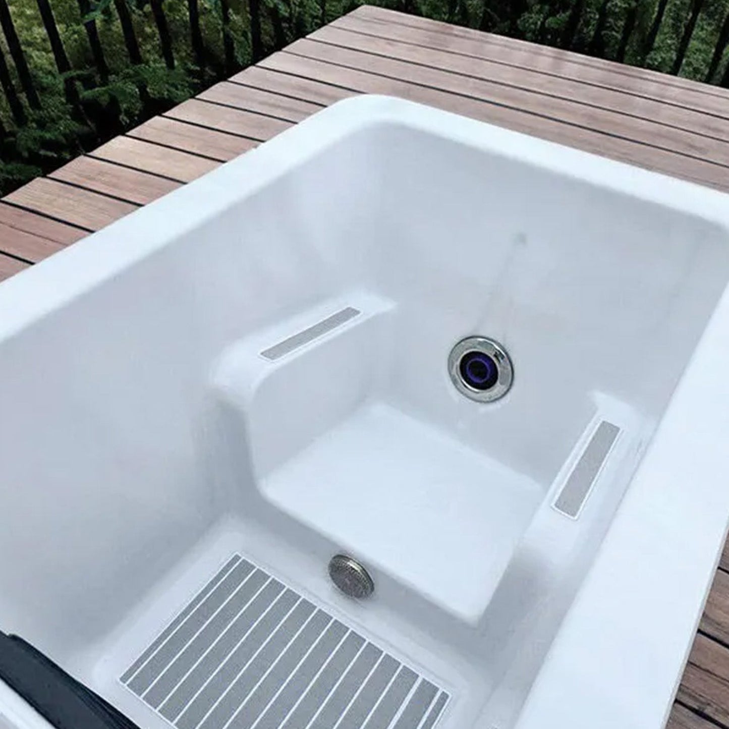 Side view of the ice bath showing the cabinet vents and control housing