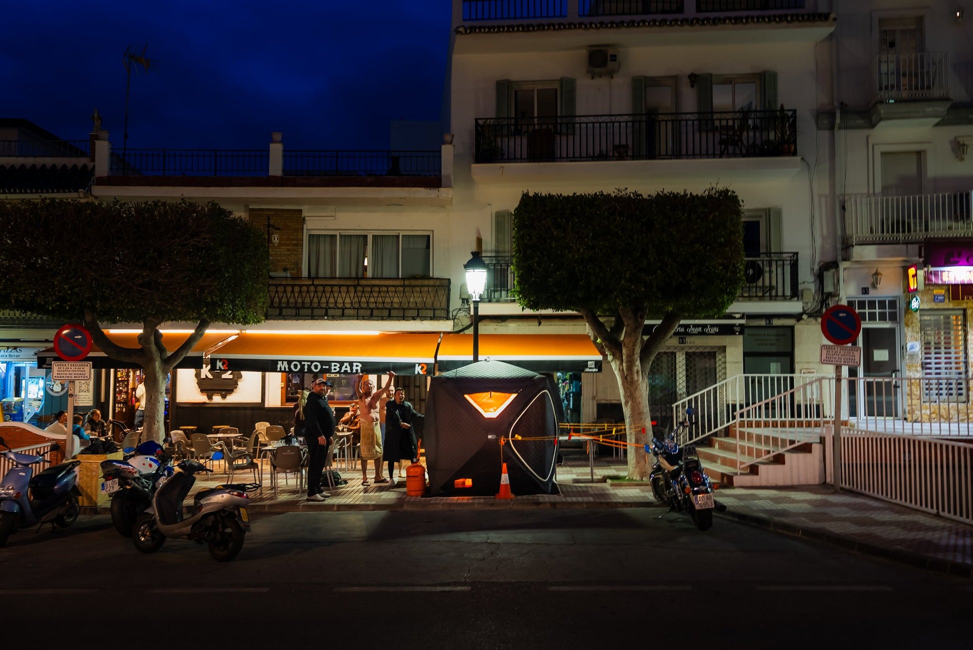 People enjoying a FinSteam portable gas sauna outdoors