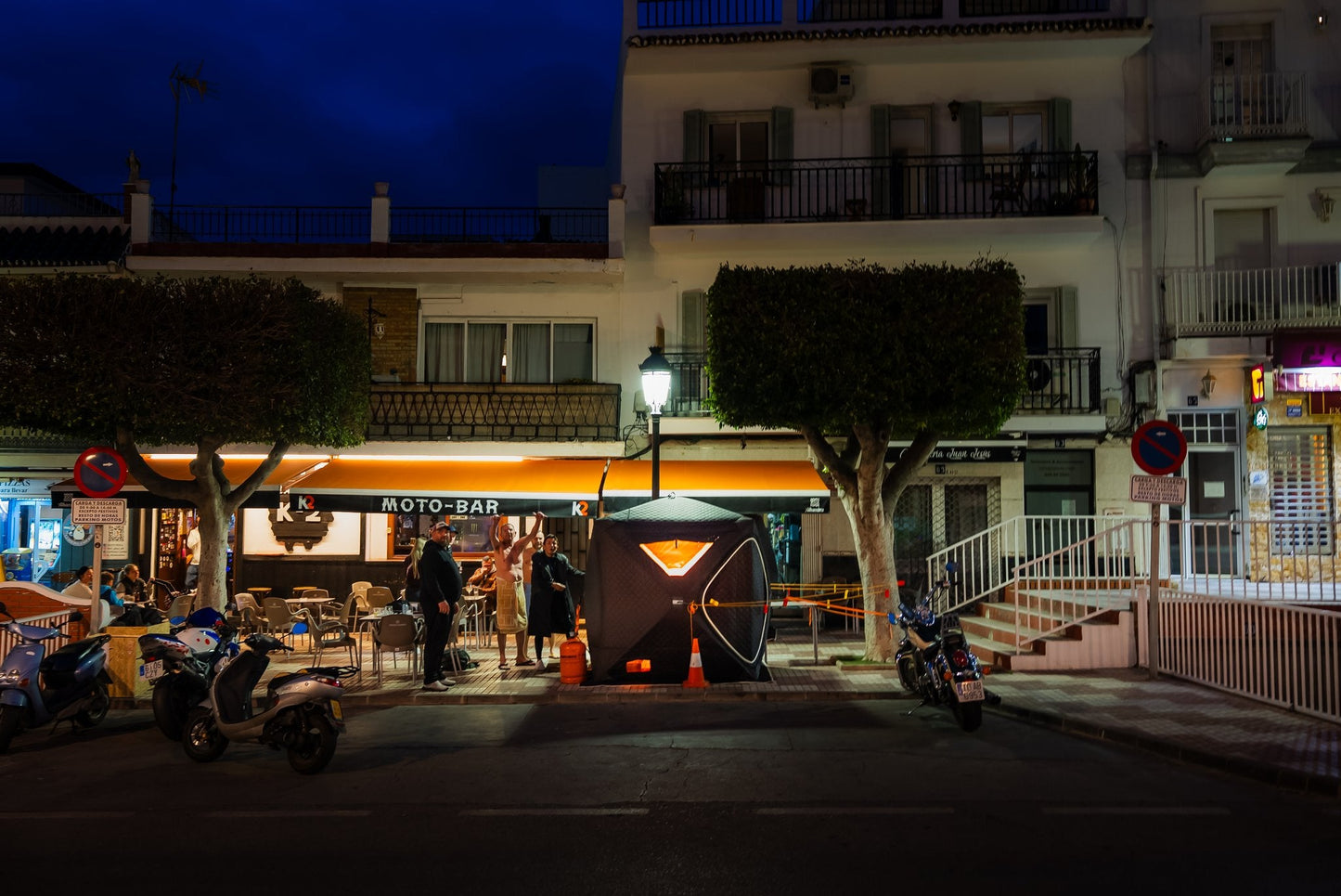 People enjoying a FinSteam portable gas sauna outdoors