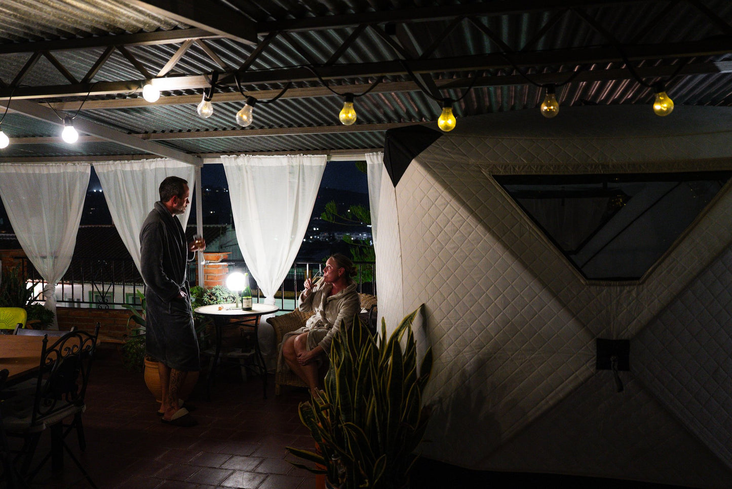 People enjoying a FinSteam portable gas sauna outdoors