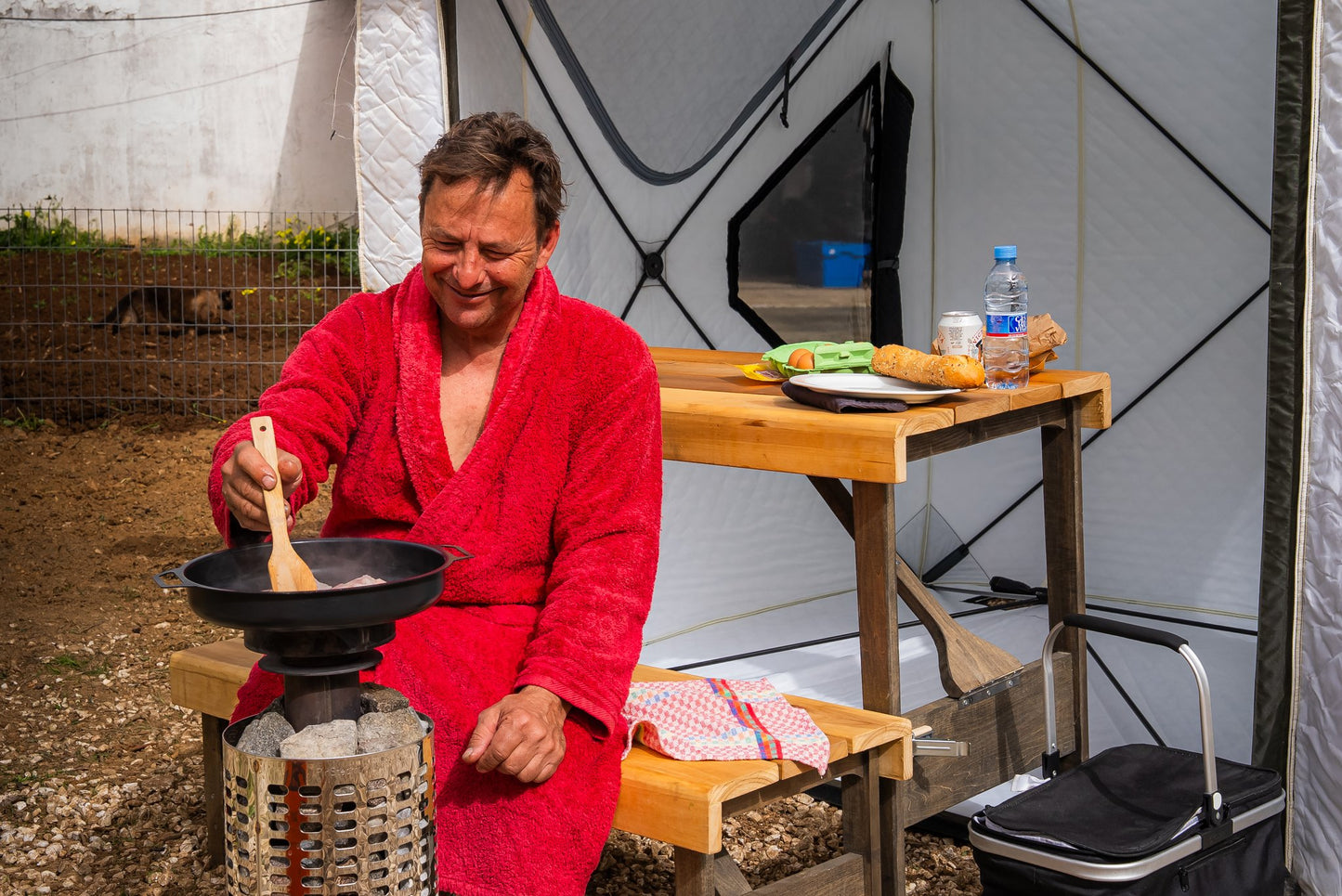 People enjoying a FinSteam portable gas sauna outdoors