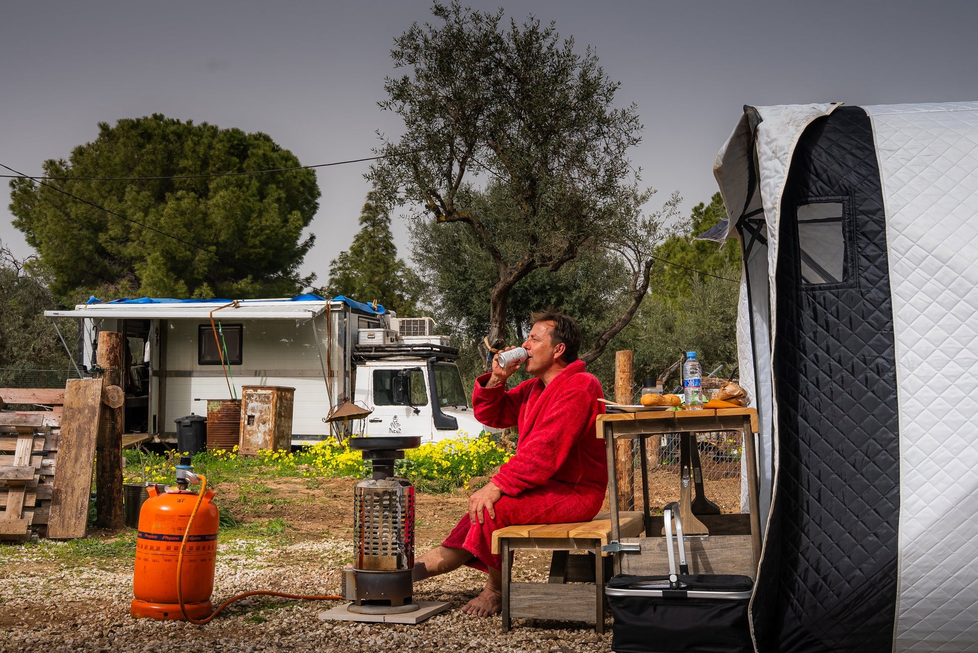 People enjoying a FinSteam portable gas sauna outdoors