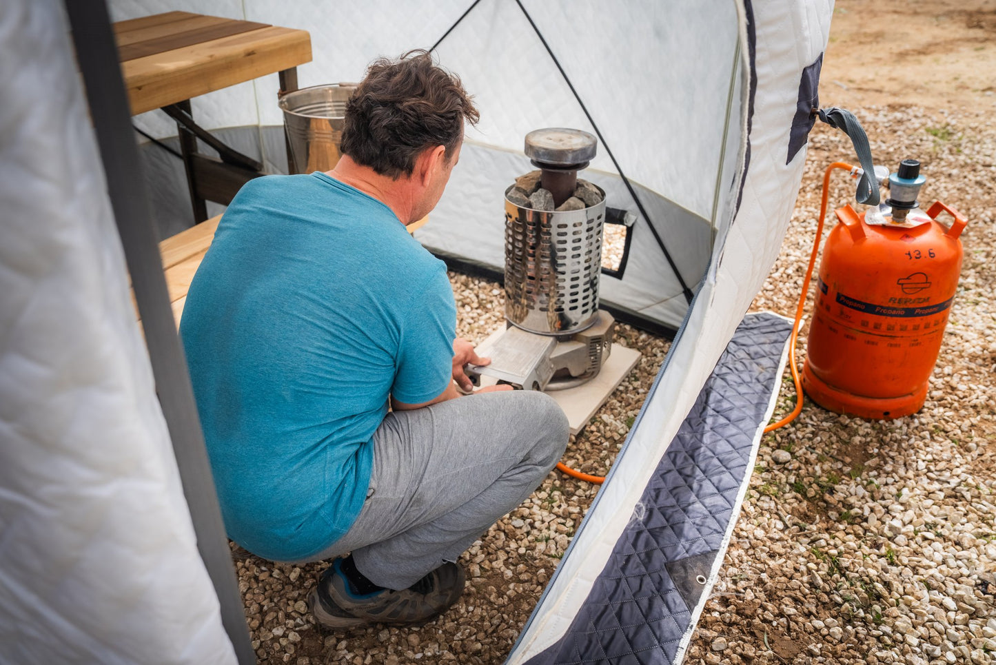 People enjoying a FinSteam portable gas sauna outdoors