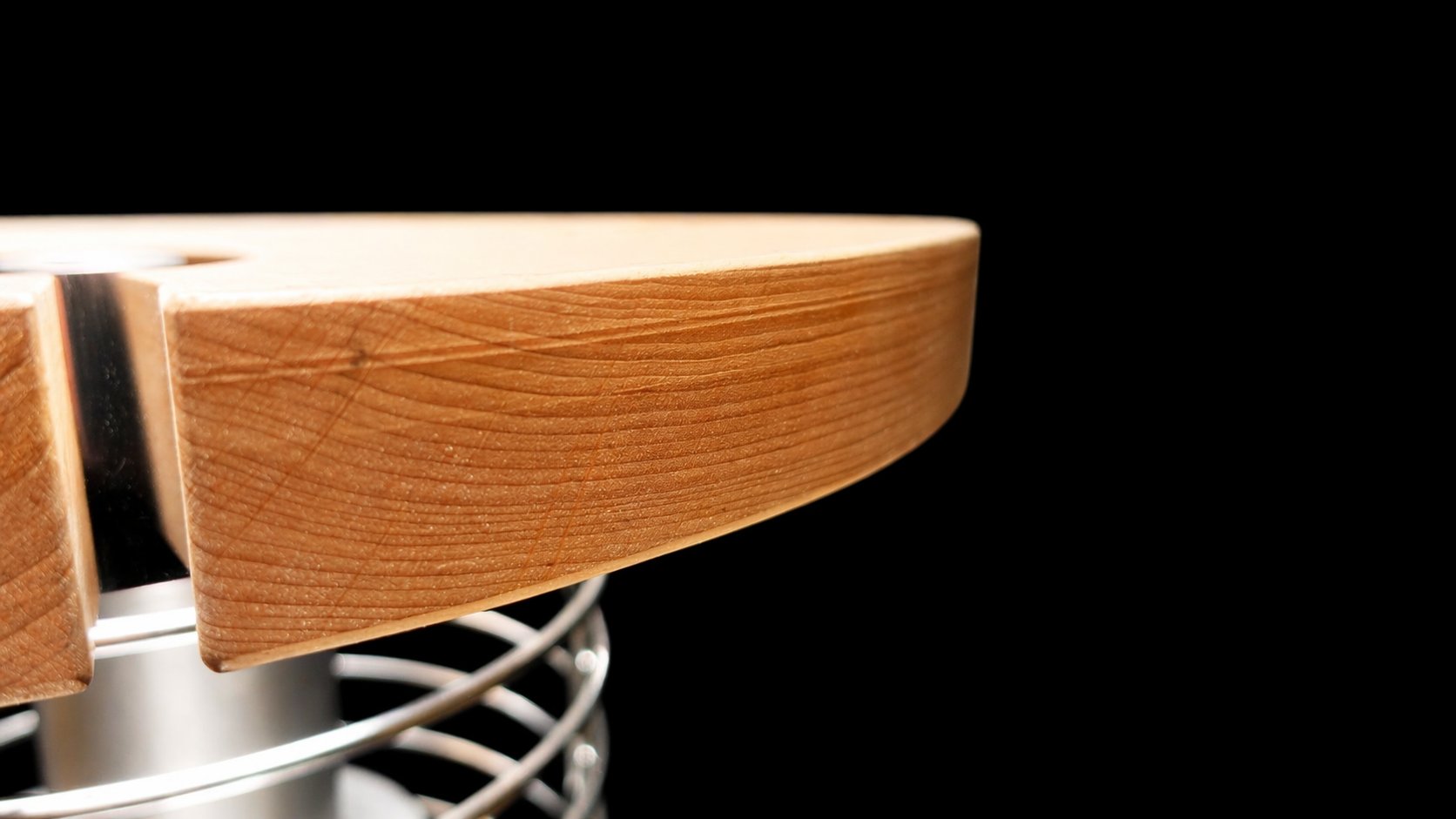 FinSteam Halo alder-wood safety rail for a gas sauna heater — black finish