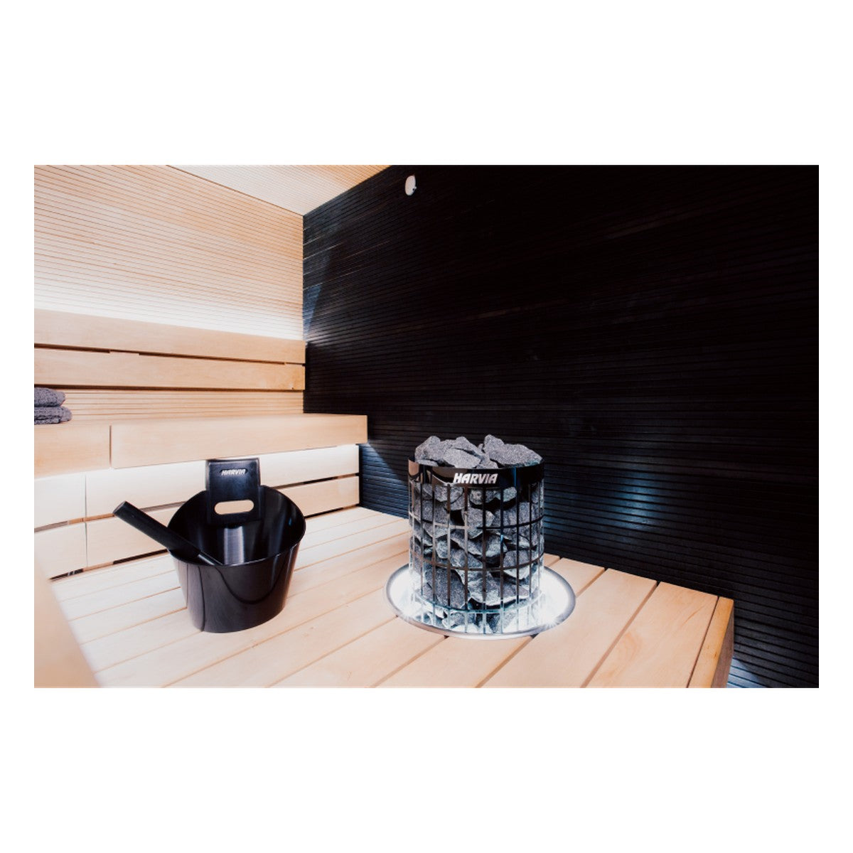 Harvia Cilindro PC90 stainless steel pillar sauna heater installed in a sauna