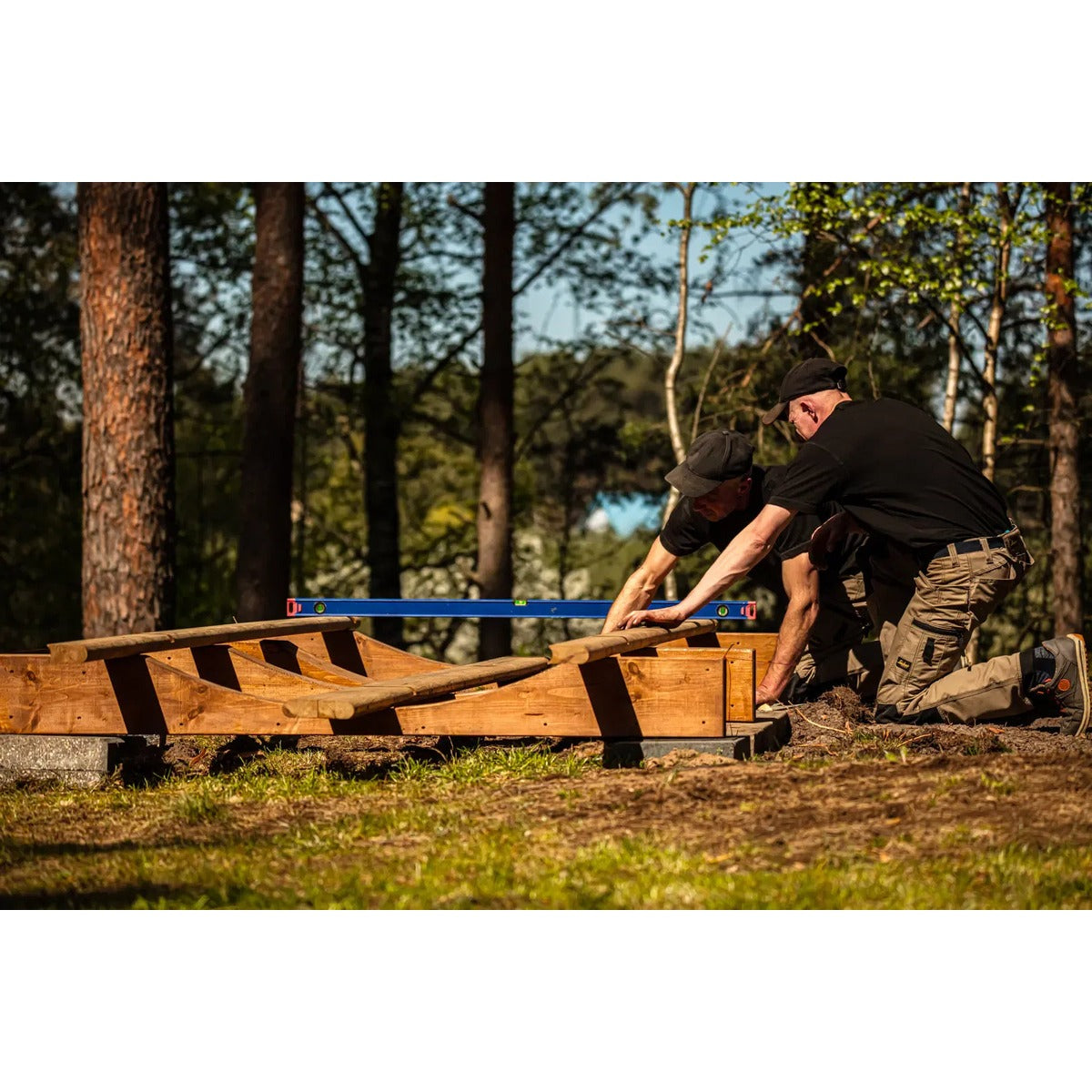 Assembly/install image showing the base supports for the Hekla Barrel Sauna 210.