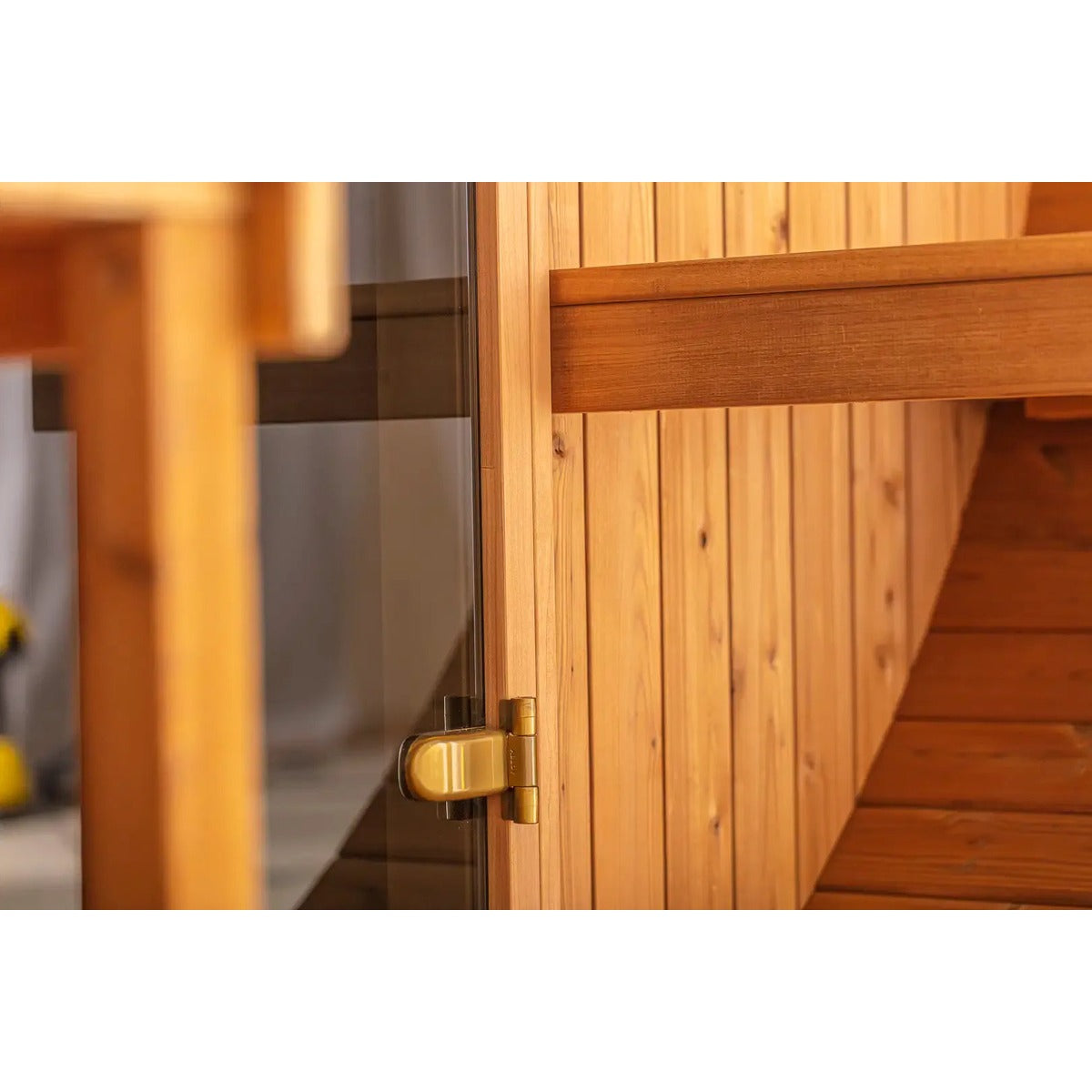 Close-up of the Hekla Barrel Sauna 210 door handle and latch.