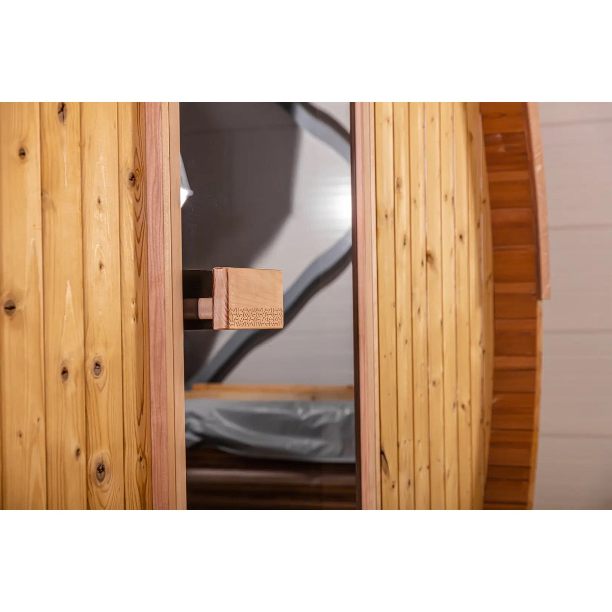 Close-up of the Hekla Barrel Sauna 250 door handle and latch.