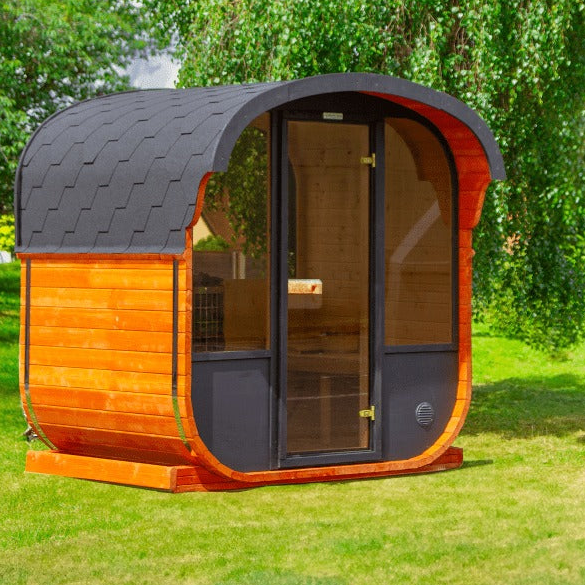 Hekla Cube Sauna 160 outdoor cube sauna, lifestyle garden front view.