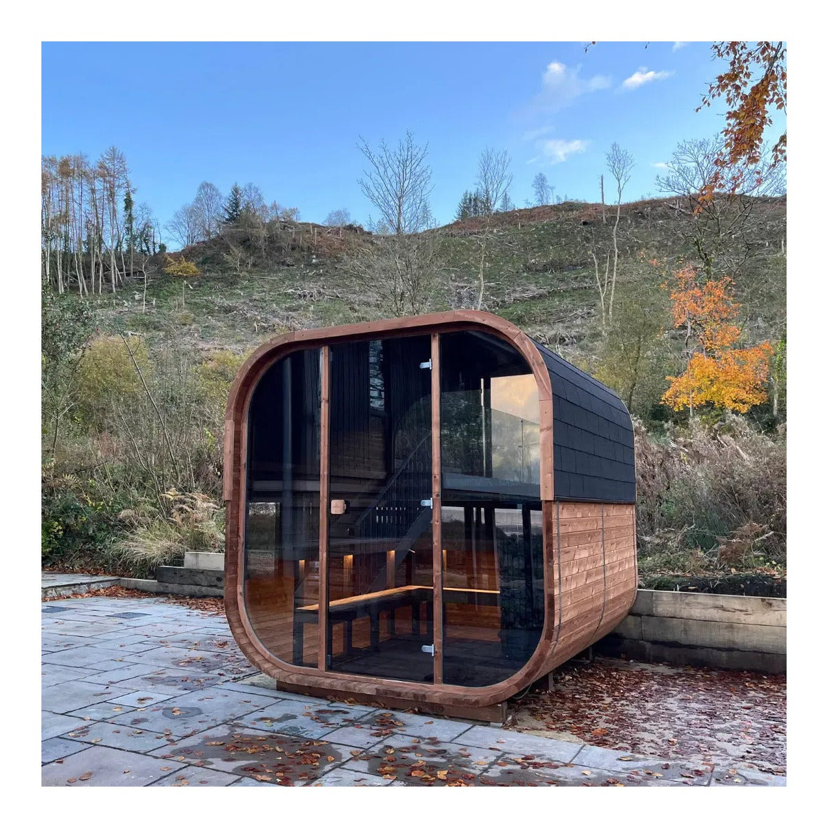 Hekla Cube Sauna 160 outdoor cube sauna, lifestyle outdoor patio installed.