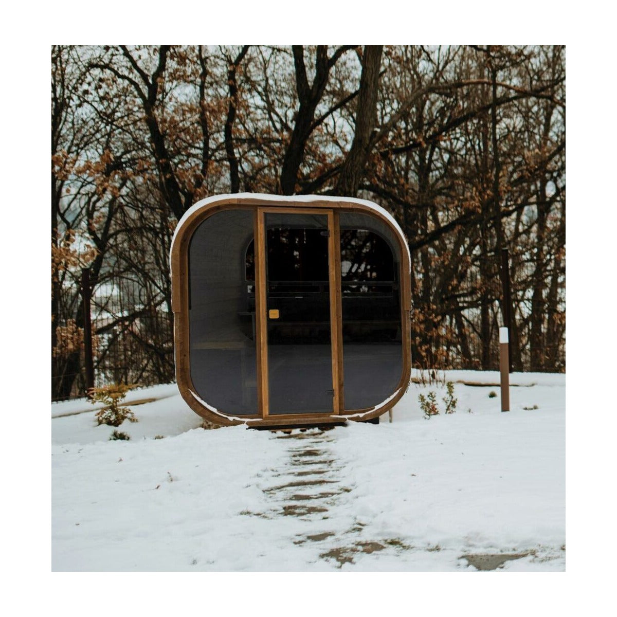 Hekla Cube Sauna 210 outdoor cube sauna, exterior front snow lifestyle.