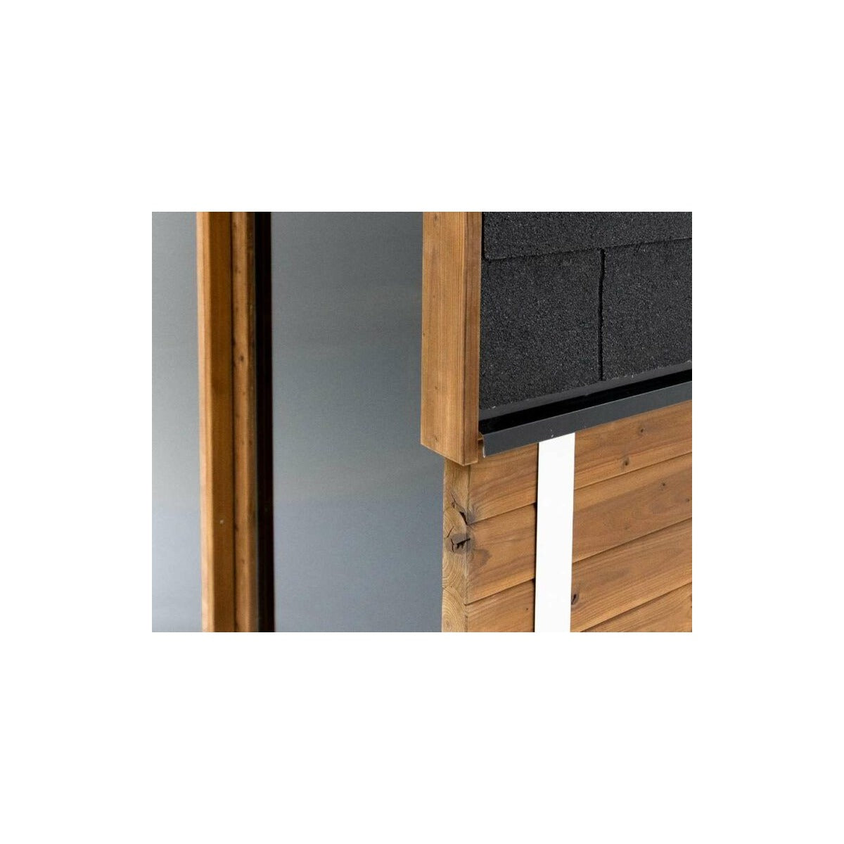 Hekla Cube Sauna 210 outdoor cube sauna, roof shingles corner closeup.