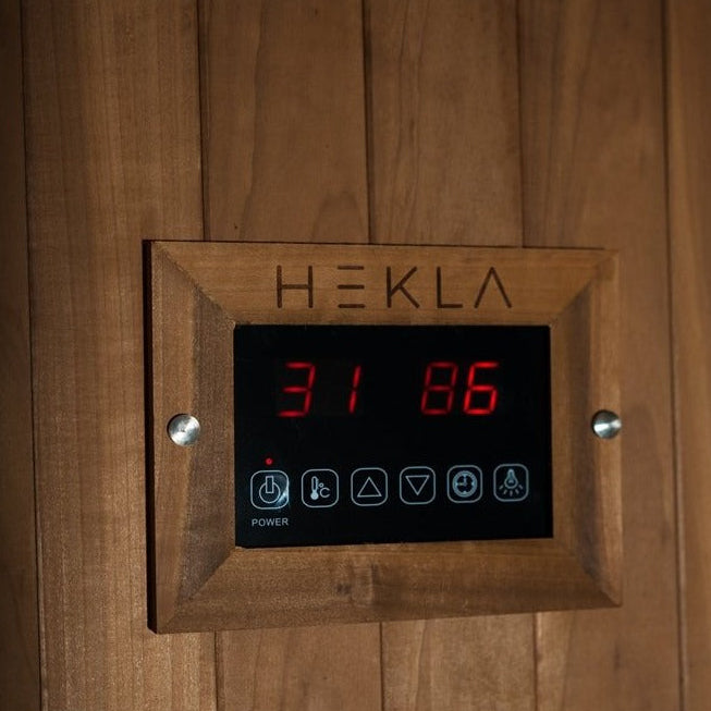 Hekla IR100 digital control panel showing temperature and settings.