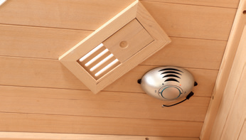 Holl's Canopée 2 two person infrared sauna with full-height glazing and horizontal slatted interior