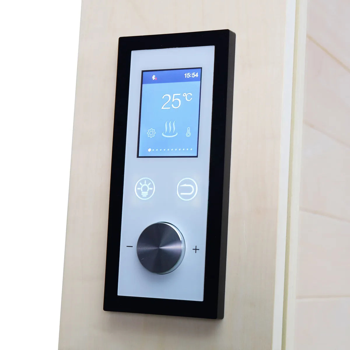 Close-up of the sauna control panel showing temperature and lighting controls