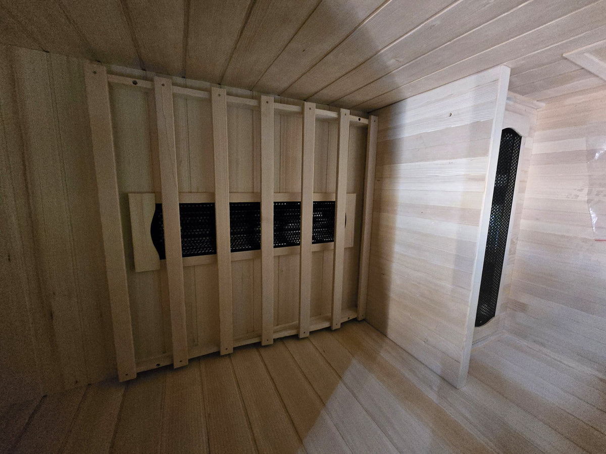 Inside the Kajo 1 — hemlock interior with full-spectrum heater panels