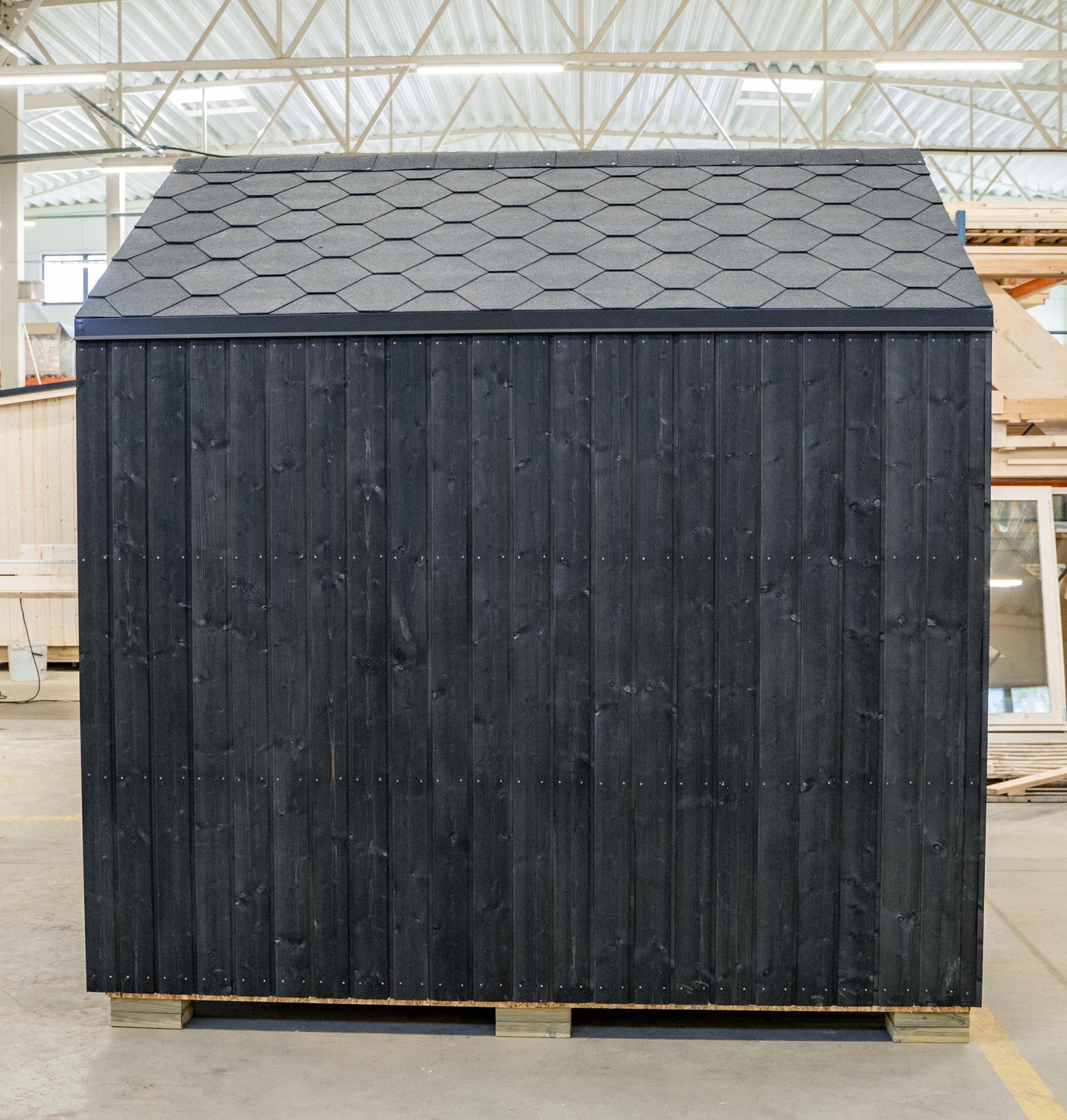 Steam & Oak Tartu pre-assembled sauna house, blackened spruce with full glass gable and aspen interior, view 4